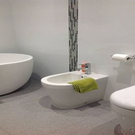 white tiles and toilet