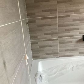 bathtub and new bathroom wall tiles 