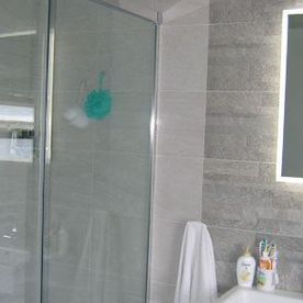 bathroom tiles with mirror and shower