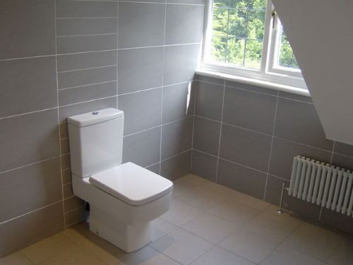 modern bathroom tiles and toilet