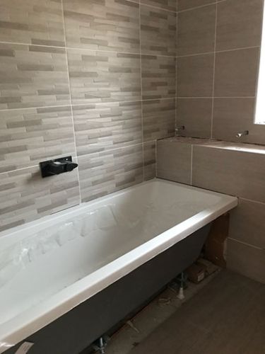 bath tub and tiles. 