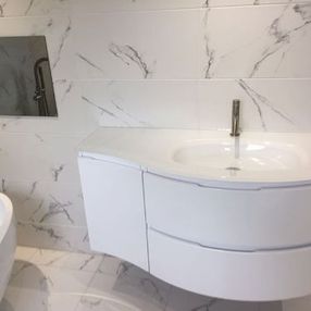 bathroom sink and white tiles
